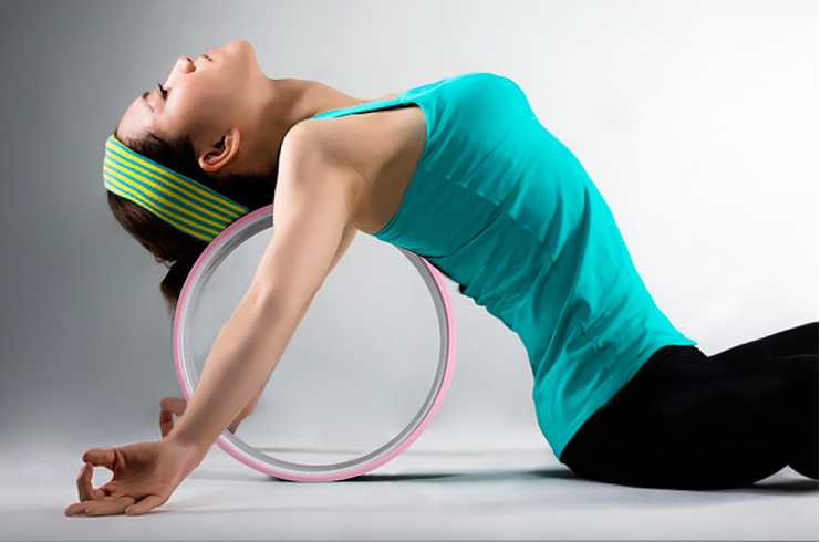 yoga wheel to improve practice
